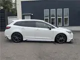2021 Toyota Corolla Touring Hybrid Double WBY ★ Modellista Aero ★ Genuine Navigation System ★ Pearl Van for sale, Japanese used car export - photo 8 of 37 | GULJI TRADERS