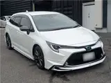 2021 Toyota Corolla Touring Hybrid Double WBY ★ Modellista Aero ★ Genuine Navigation System ★ Pearl Van for sale, Japanese used car export - photo 9 of 37 | GULJI TRADERS