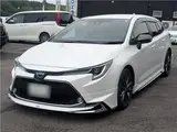 2021 Toyota Corolla Touring Hybrid Double WBY ★ Modellista Aero ★ Genuine Navigation System ★ Pearl Van for sale, Japanese used car export - photo 10 of 37 | GULJI TRADERS