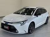 2021 Toyota Corolla Touring Hybrid Double WBY ★ Genuine 9-inch Navigation System ★ AC 100V ★ Pearl Van for sale, Japanese used car export - photo 1 of 62 | GULJI TRADERS