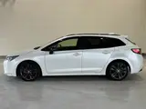 2021 Toyota Corolla Touring Hybrid Double WBY ★ Genuine 9-inch Navigation System ★ AC 100V ★ Pearl Van for sale, Japanese used car export - photo 4 of 62 | GULJI TRADERS