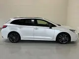 2021 Toyota Corolla Touring Hybrid Double WBY ★ Genuine 9-inch Navigation System ★ AC 100V ★ Pearl Van for sale, Japanese used car export - photo 8 of 62 | GULJI TRADERS