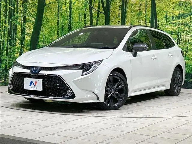 2021 Toyota Corolla Touring Hybrid Double By Pearl Van for sale, Japanese used car export - photo 1 of 30 | GULJI TRADERS