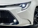 2021 Toyota Corolla Touring Hybrid Double By Pearl Van for sale, Japanese used car export - photo 19 of 30 | GULJI TRADERS