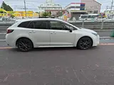 2021 Toyota Corolla Touring Hybrid Double Bye Bye Pearl Van for sale, Japanese used car export - photo 10 of 20 | GULJI TRADERS