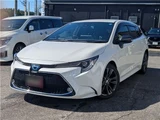 2021 Toyota Corolla Touring Hybrid Van for sale, Japanese used car export - photo 1 of 39 | GULJI TRADERS