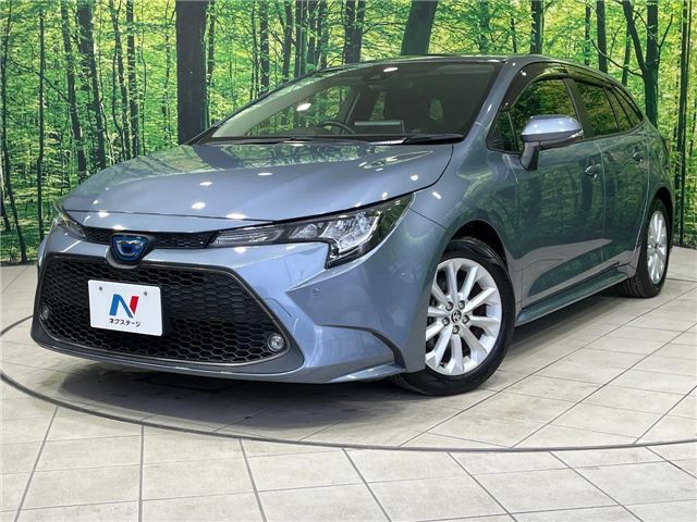 2021 Toyota Corolla Touring Hybrid S Van for sale, Japanese used car export - photo 1 of 30 | GULJI TRADERS