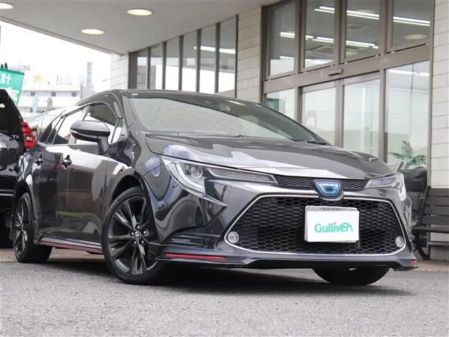 2021 Toyota Corolla Touring Hybrid Double By - photo 1 2021 Toyota Corolla Touring Hybrid Double By Black Van for sale, Japanese used car export - photo 1 of 21 | GULJI TRADERS