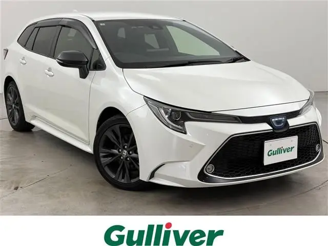 2021 Toyota Corolla Touring Hybrid Double By - photo 1 2021 Toyota Corolla Touring Hybrid Double By Pearl Van for sale, Japanese used car export - photo 1 of 24 | GULJI TRADERS