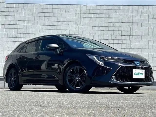2021 Toyota Corolla Touring Hybrid Double WxB 4WD - photo 1 2021 Toyota Corolla Touring Hybrid Double WxB 4WD Black Van for sale, Japanese used car export - photo 1 of 21 | GULJI TRADERS