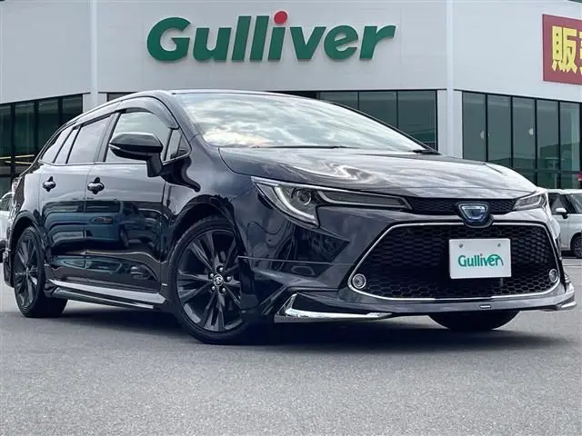 2021 Toyota Corolla Touring Hybrid Double By - photo 1 2021 Toyota Corolla Touring Hybrid Double By Black Van for sale, Japanese used car export - photo 1 of 24 | GULJI TRADERS