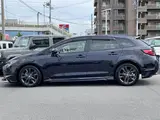 2021 Toyota Corolla Touring Hybrid Double By Black Van for sale, Japanese used car export - photo 24 of 24 | GULJI TRADERS
