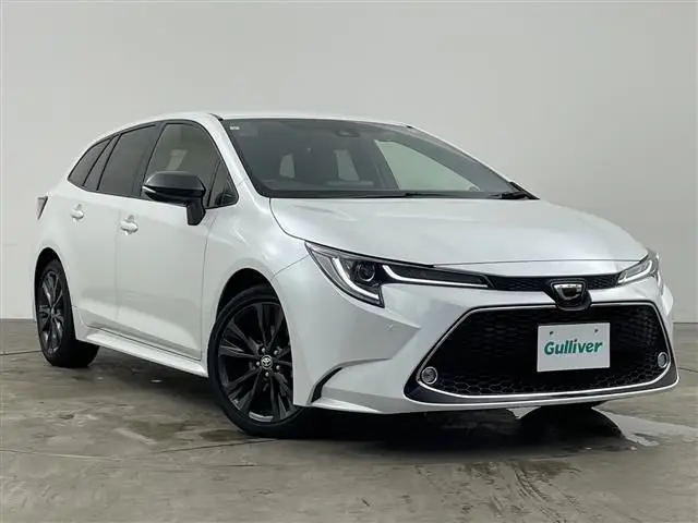 2021 Toyota Corolla Touring Double Bye - photo 1 2021 Toyota Corolla Touring Double Bye White Van for sale, Japanese used car export - photo 1 of 24 | GULJI TRADERS