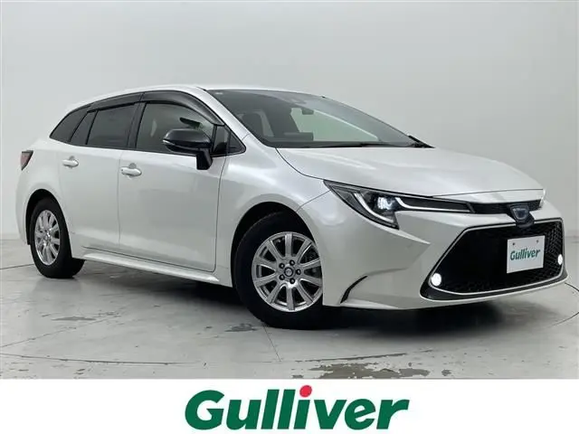 2021 Toyota Corolla Touring Hybrid Double By - photo 1 2021 Toyota Corolla Touring Hybrid Double By Pearl Van for sale, Japanese used car export - photo 1 of 23 | GULJI TRADERS