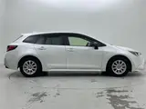 2021 Toyota Corolla Touring Hybrid Double By Pearl Van for sale, Japanese used car export - photo 21 of 23 | GULJI TRADERS
