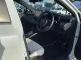 2021 Toyota Corolla Touring Hybrid Double WxB 4WD Pearl Van for sale, Japanese used car export - photo 21 of 24 | GULJI TRADERS
