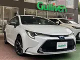 2021 Toyota Corolla Touring Hybrid Double By White Van for sale, Japanese used car export - photo 1 of 24 | GULJI TRADERS
