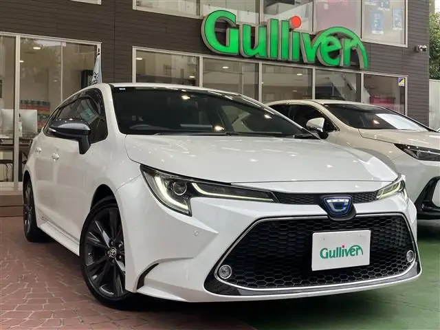 2021 Toyota Corolla Touring Hybrid Double By - photo 1 2021 Toyota Corolla Touring Hybrid Double By White Van for sale, Japanese used car export - photo 1 of 24 | GULJI TRADERS