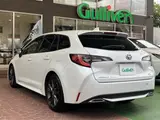2021 Toyota Corolla Touring Hybrid Double By White Van for sale, Japanese used car export - photo 2 of 24 | GULJI TRADERS