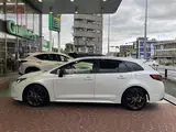2021 Toyota Corolla Touring Hybrid Double By White Van for sale, Japanese used car export - photo 10 of 24 | GULJI TRADERS