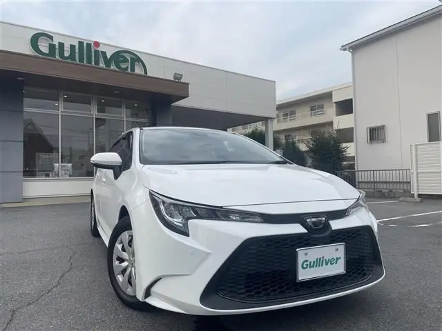 2021 Toyota Corolla Touring G-X Plus - photo 1 2021 Toyota Corolla Touring G-X Plus White Van for sale, Japanese used car export - photo 1 of 24 | GULJI TRADERS