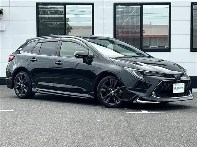 2021 Toyota Corolla Touring Hybrid Double By - photo 1 2021 Toyota Corolla Touring Hybrid Double By Black Van for sale, Japanese used car export - photo 1 of 24 | GULJI TRADERS