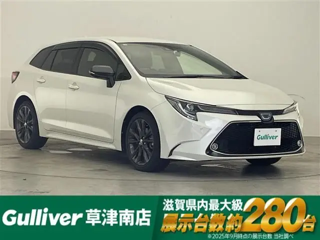 2021 Toyota Corolla Touring Hybrid Double By - photo 1 2021 Toyota Corolla Touring Hybrid Double By Pearl Van for sale, Japanese used car export - photo 1 of 24 | GULJI TRADERS