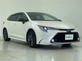 2021 Toyota Corolla Touring Hybrid Van for sale, Japanese used car export - photo 1 of 24 | GULJI TRADERS