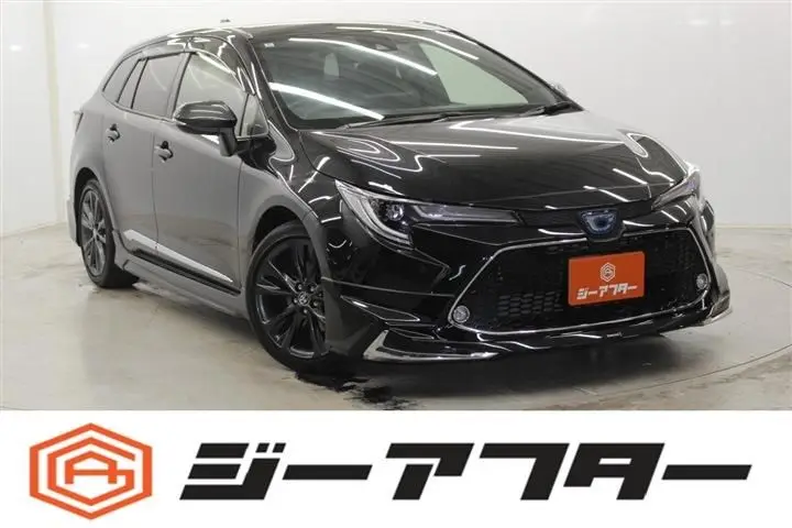 2021 Toyota Corolla Touring 1.8 HYBRID WxB - photo 1 2021 Toyota Corolla Touring 1.8 HYBRID WxB Black Van for sale, Japanese used car export - photo 1 of 30 | GULJI TRADERS