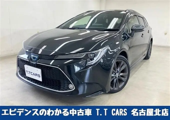 2021 Toyota Corolla Touring HYBRID WxB - photo 1 2021 Toyota Corolla Touring HYBRID WxB Black Van for sale, Japanese used car export - photo 1 of 30 | GULJI TRADERS