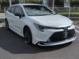 2021 Toyota Corolla Touring HYBRIDW×B 2WD Pearl Van for sale, Japanese used car export - photo 19 of 24 | GULJI TRADERS