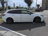 2021 Toyota Corolla Touring HYBRIDW×B 2WD Pearl Van for sale, Japanese used car export - photo 20 of 24 | GULJI TRADERS