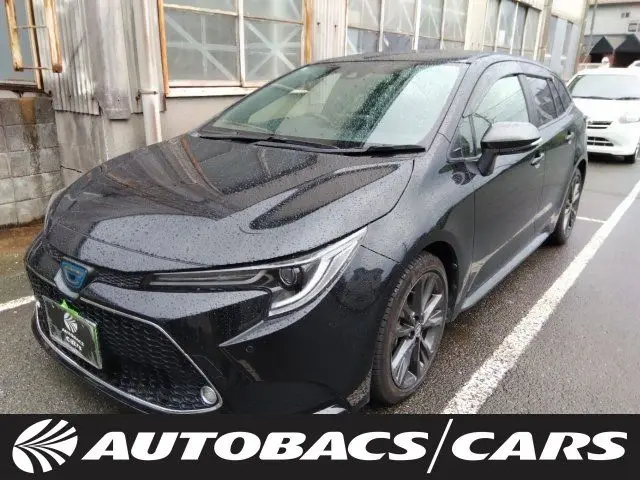 2021 Toyota Corolla Touring 1800 HYBRID W×B 5-door FCVT 2WD 5-seater - photo 1 2021 Toyota Corolla Touring 1800 HYBRID W×B 5-door FCVT 2WD 5-seater Black Van for sale, Japanese used car export - photo 1 of 3 | GULJI TRADERS