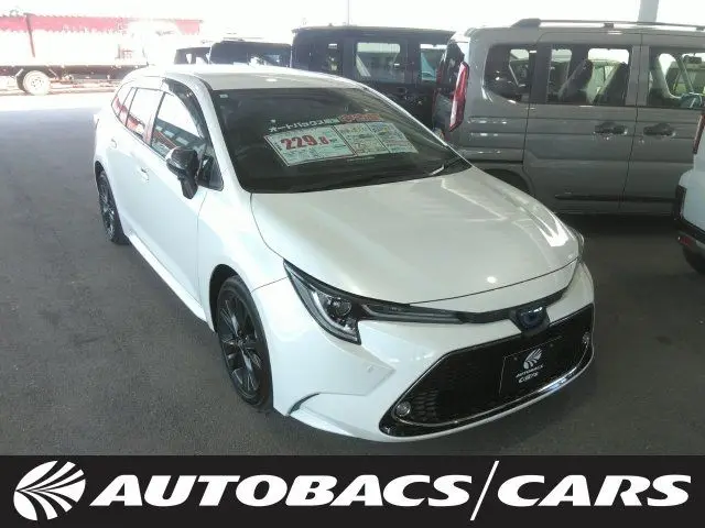 2021 Toyota Corolla Touring HYBRIDW×B 2WD - photo 1 2021 Toyota Corolla Touring HYBRIDW×B 2WD Pearl Van for sale, Japanese used car export - photo 1 of 7 | GULJI TRADERS