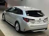 2021 Toyota Corolla Touring Hybrid S Silver Van for sale, Japanese used car export - photo 3 of 3 | GULJI TRADERS