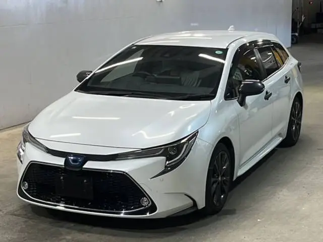 2021 Toyota Corolla Touring Hybrid Double By - photo 1 2021 Toyota Corolla Touring Hybrid Double By Pearl Van for sale, Japanese used car export - photo 1 of 3 | GULJI TRADERS