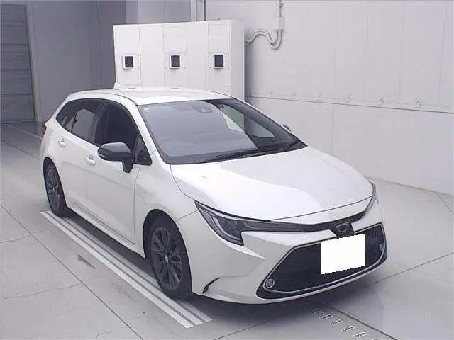 2021 Toyota Corolla Touring Touring WxB TSS - photo 1 2021 Toyota Corolla Touring Touring WxB TSS Pearl Van for sale, Japanese used car export - photo 1 of 11 | GULJI TRADERS