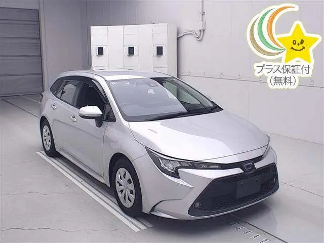 2021 Toyota Corolla Touring Touring Hybrid G-X Silver Van for sale, Japanese used car export - photo 1 of 12 | GULJI TRADERS