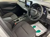 2021 Toyota Corolla Touring Hybrid G-X 4WD Silver Van for sale, Japanese used car export - photo 5 of 12 | GULJI TRADERS