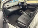 2021 Toyota Corolla Touring Hybrid G-X 4WD White Van for sale, Japanese used car export - photo 9 of 12 | GULJI TRADERS