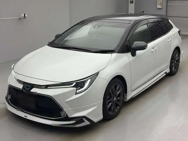 2021 Toyota Corolla Touring Hybrid Double By Pearl Van for sale, Japanese used car export - photo 1 of 15 | GULJI TRADERS