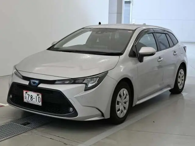 2021 Toyota Corolla Touring Hybrid G-X Pla 4WD - photo 1 2021 Toyota Corolla Touring Hybrid G-X Pla 4WD Silver Van for sale, Japanese used car export - photo 1 of 12 | GULJI TRADERS