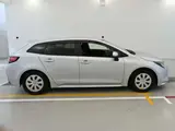 2021 Toyota Corolla Touring Hybrid G-X Pla 4WD Silver Van for sale, Japanese used car export - photo 3 of 12 | GULJI TRADERS