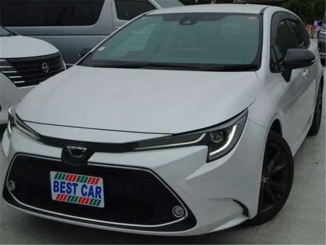 2021 Toyota Corolla Touring Double Bye - photo 1 2021 Toyota Corolla Touring Double Bye White Van for sale, Japanese used car export - photo 1 of 45 | GULJI TRADERS