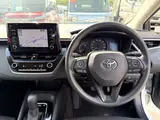 2021 Toyota Corolla Touring 4WD HYBRID G-X White Van for sale, Japanese used car export - photo 8 of 24 | GULJI TRADERS