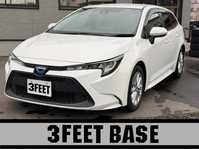 2021 Toyota Corolla Touring Hybrid S - photo 1 2021 Toyota Corolla Touring Hybrid S White Van for sale, Japanese used car export - photo 1 of 24 | GULJI TRADERS