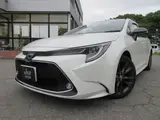 2021 Toyota Corolla Touring HYBRID WXB Pearl Van for sale, Japanese used car export - photo 1 of 24 | GULJI TRADERS