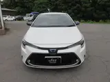 2021 Toyota Corolla Touring HYBRID WXB Pearl Van for sale, Japanese used car export - photo 4 of 24 | GULJI TRADERS