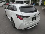 2021 Toyota Corolla Touring HYBRID WXB Pearl Van for sale, Japanese used car export - photo 9 of 24 | GULJI TRADERS