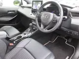 2021 Toyota Corolla Touring HYBRID WXB Pearl Van for sale, Japanese used car export - photo 22 of 24 | GULJI TRADERS
